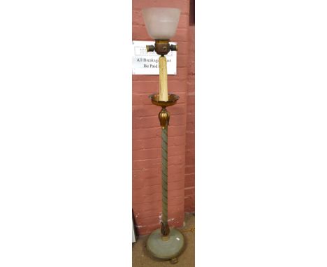 An early 20th century painted and gilt detailed standard lamp with opaque shade on circular base to three paw feet, height 17