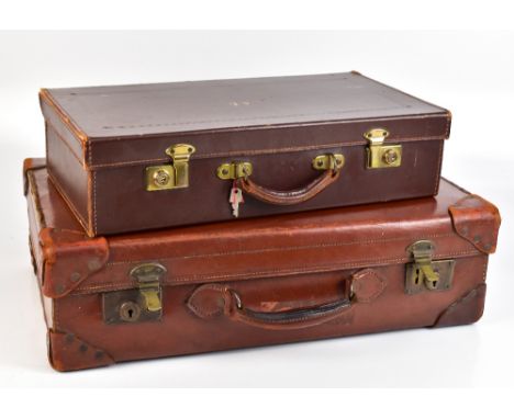Two vintage stitched leather suitcases, the larger with initials 'RH', 36 x 61.5cm excluding handle, the smaller with initals