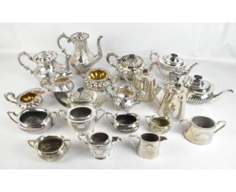 A group of silver plated tea ware to include a squat three piece tea set with cast floral detail, part gadrooned and chased e