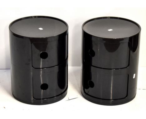 ANNA CASTELLI FOR CARTELL; a pair of black plastic two tiered cylindrical cabinets, No.4965-67, diameter 31.5cm, height 40cm.