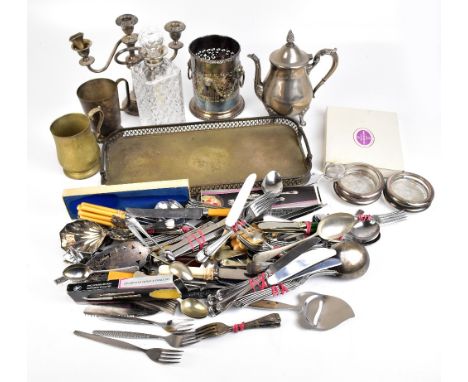 A group of silver plated items including bottle coasters, teapot, candelabrum, purse, collared decanter with ‘Whisky’ label, 