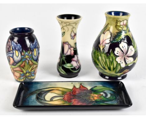 MOORCROFT; three floral tubeline decorated vases (one seconds quality), the tallest height 13.5cm, and a rectangular dish (se