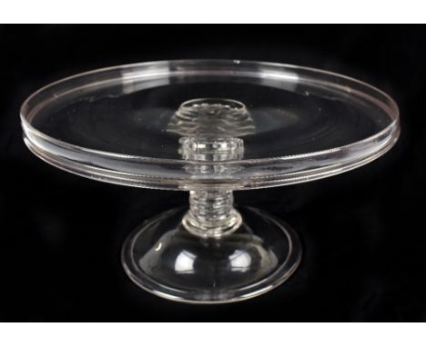 A George III glass tazza with raised rim and lobed ring turned central column to domed folded foot, diameter 34.5cm, height 1