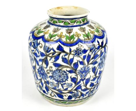 A 19th century Iznik ceramic vase with painted floral detail, height 23cm.Additional InformationChip to the top and foot rim,