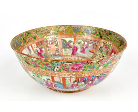 A late 19th century Canton footed bowl, painted with figures inside a panel of Greek key style motif, insects and floral spra