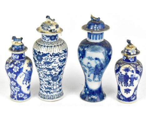 Four early 20th century Chinese blue and white lidded jars to include an example decorated with Buddhist precious objects, ea