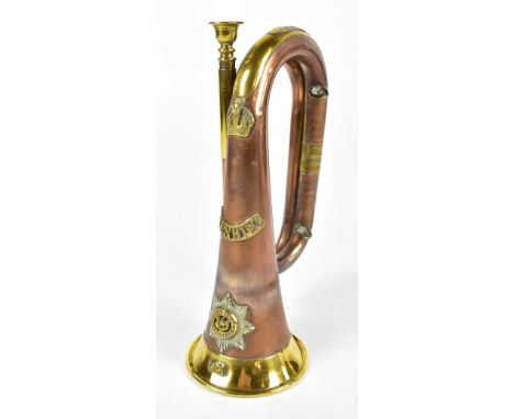A military issued copper and brass bugle for the Cheshire Regiment, ascribed to 4923.Bugler S. Taylor, also inscribed with WD