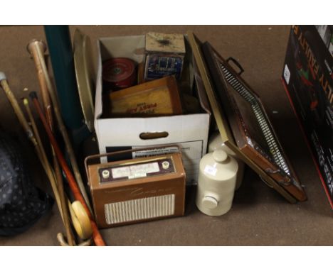 A QUANTITY OF WALKING STICKS TOGETHER WITH A VINTAGE RADIO & COLLECTABLE TINS ETC