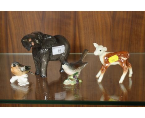 THREE BESWICK FIGURES TO INCLUDE AN ELEPHANT, A WHITETHROAT + A CALF TOGETHER WITH A GOEBEL FINCH  (4)