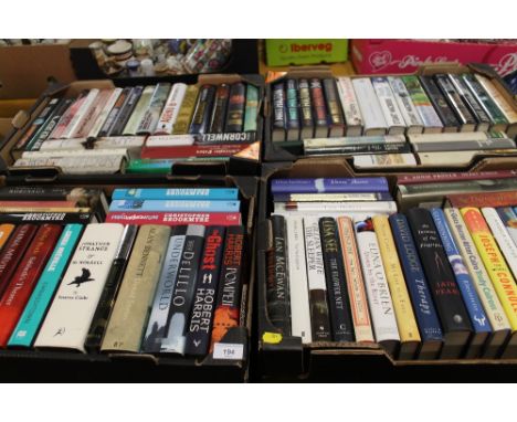 FOUR TRAYS OF MODERN HARD BACK FIRST EDITION BOOKS