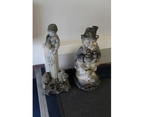 A LEPRECHAUN GARDEN ORNAMENT & ANOTHER (2)