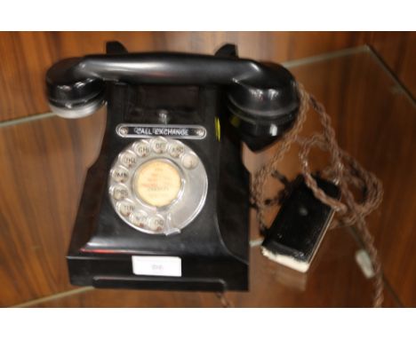 A VINTAGE BLACK BAKELITE TELEPHONE  A/F