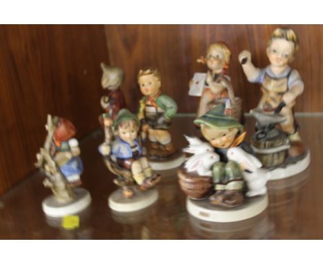 A COLLECTION OF SEVEN GOEBEL + FRIEDEL FIGURES  (7)
