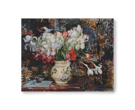JACQUES-EMILE BLANCHE (1861-1942)Bouquet d'iris blanches et de tulipes rouges signé 'J. E. Blanche' (en bas à droite)huile su