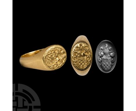 17th century A.D.. With a D-section hoop flaring out to an oval bezel bearing the engraved incuse arms 'party per fess, two f