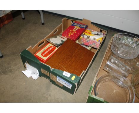 A box containing fish knives and forks; die-cast vehicles; harmonica etc.