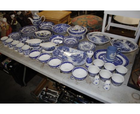 A large collection of various pattern blue and white china to include Old Willow pattern, Booths Real Old Willow pattern, Cop
