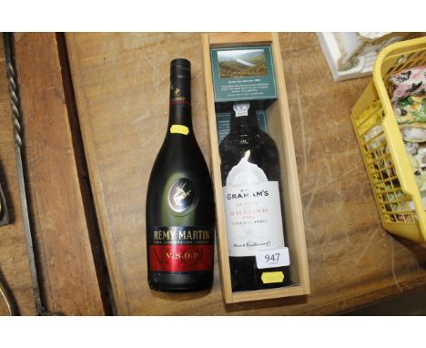A bottle of Grahams 1998 Vintage Port and a bottle of Remy Martin 