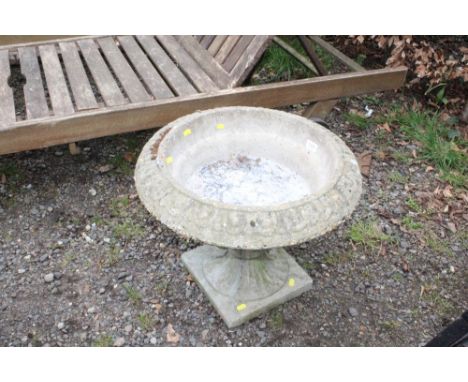A concrete garden planter