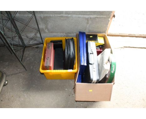 Two boxes containing various tins, briefcase, bags etc.