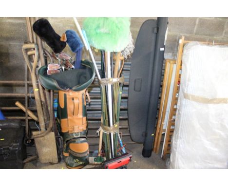 A bundle of various long handled gardening tools etc.