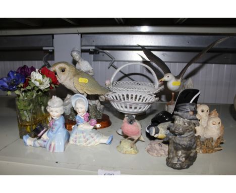 A Nao figure group; a seagull ornament; various bird ornaments; a pair of bookends etc.