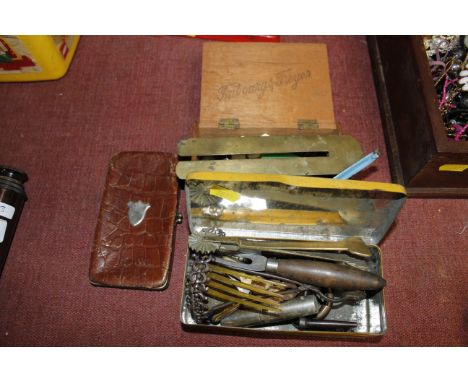 A tin, a box and various small sundry items including vintage keys and clock key etc