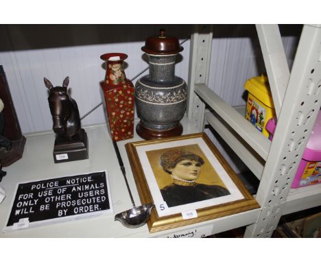 A silver plated ebony handled punch ladle; a framed portrait print; floral decorated vase; another vase raised on wooden stan