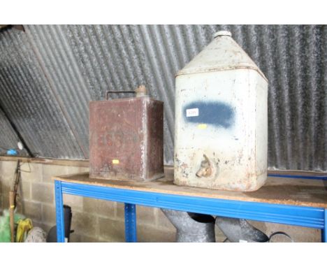 A vintage Esso fuel can together with a vintage oil can