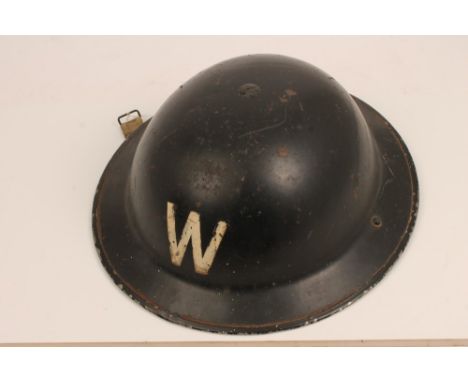 Second World War Air Raid Wardens' tin helmet with white painted 'W' on back and front, original lining and straps