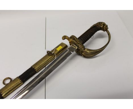 Late 19th century Continental Naval Officers' sword with gilt brass Gothic hilt, lion's head pommel and wire-bound fish-skin 