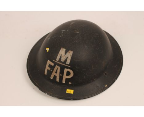 Second World War tin helmet with period painted lettering - M.  F.A.P. for First Aid Post Marconi, named to Rees Morgan insid