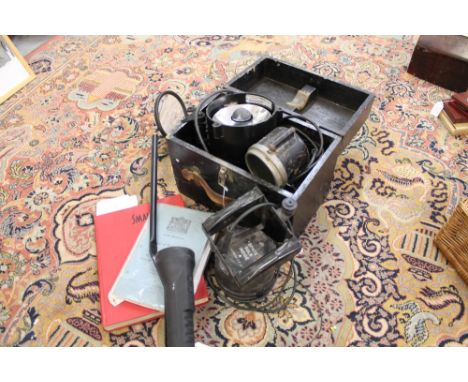 Second World War Morse Code lamp in box, two other similar, a British Military issue bomb inspection torch and mirror and a C