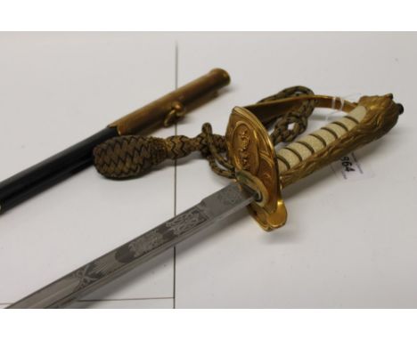 Fine Queen Elizabeth II Naval Officers' dress sword in excellent original condition with gilt brass lion's head pommel and Go