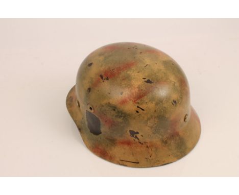 Nazi M35 Type helmet with camouflage painted top, interior tan leather lining