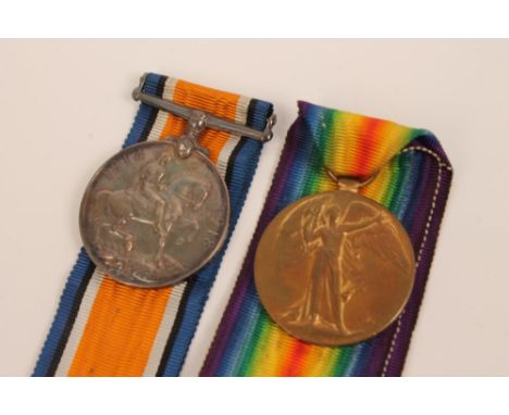 First World War pair, comprising War and Victory medals, named to 21128 PTE. C. Saltmarsh.  The Queen's. R