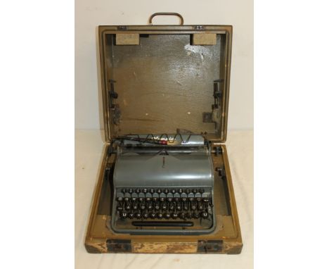 Second World War German Olympia typewriter in original wooden case, believed to be of the type used by the S.S