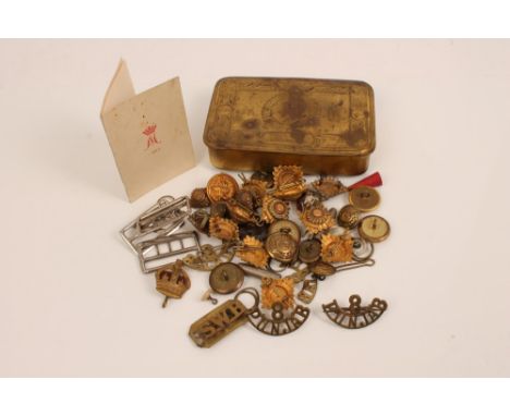 First World War Princess Mary gift tin, with Christmas card, together with various shoulder Pips, military badges and buttons