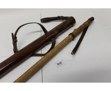 British South Africa Police Rhodesia rope-bound riot stick / baton, with brown leather handle, in brown leather sheath, 95cm 