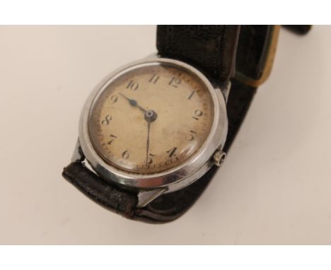 Second World War period R.A.F. wristwatch in Dennison steel case with Arabic numeral dial and blued steel hands, rear of case