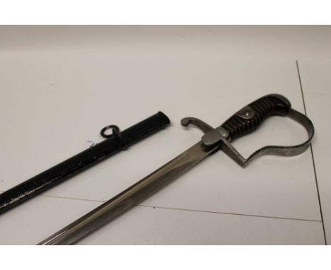 First World War Imperial German Cavalry Officers' sword with steel stirrup hilt, wire-bound grip, slightly curved plated full