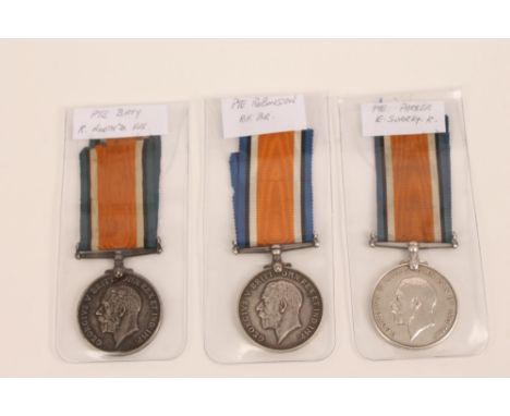 Collection of three First World War, War medals, named to 33149 PTE. H. Parker. E. SURR. R., 5 - 32297 PTE. C. W. Robinson  R