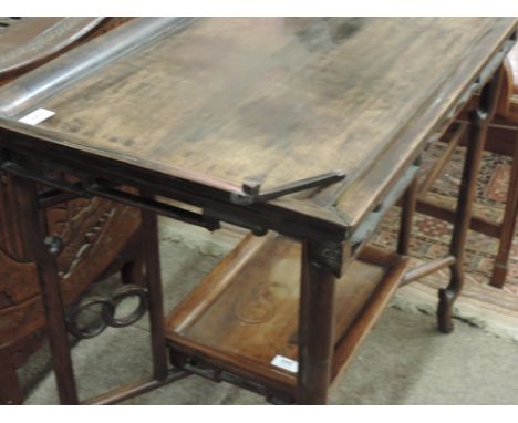 A heavy Oriental hardwood tray top Occasional Table, with fret carved rim, of rectangular shape with smaller matching underne