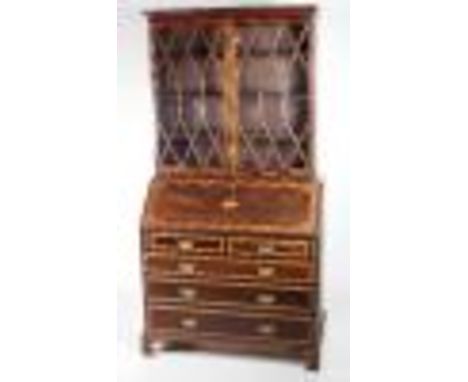 A good quality George III inlaid and crossbanded slope front Bureau Desk, the drop front opening to reveal an attractive fitt