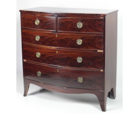 An inlaid mahogany bow fronted Chest, of two short and three long drawers on splayed bracket feet. (1)Provenance : Colonel Ha