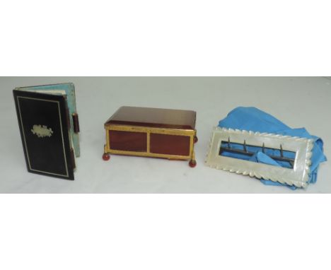 A small rectangular 19th Century casket shaped Agate Box, with gilt metal mounts and ball feet; a Georgian mother-o-pearl Buc