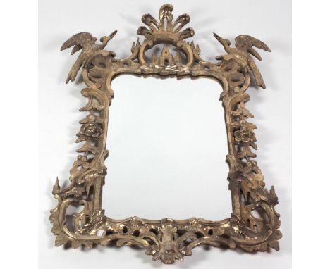 A fine quality Irish George III style giltwood Mirror, decorated with flowers and foliage, the capital with carved inset foll