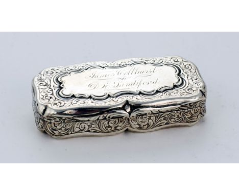 A finely engraved shaped rectangular Snuff Box, by Nathaniel Mills, Birmingham c. 1848, 7.5cms long. (1)