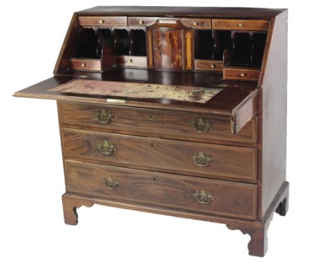 A good early George III period figured mahogany Bureau Desk, the inlaid drop front opening to reveal an attractive finely fit