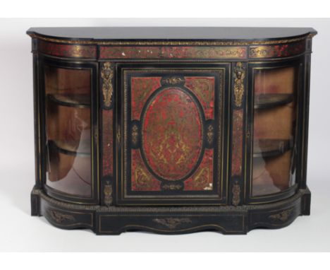 An attractive 19th Century red Boulle breakfront Credenza, with shaped top over a decorated frieze and panel door, and with d